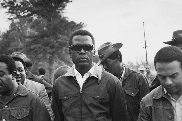 Photograph: Bahamian-American actor and civil rights activist Sidney Poitier (centre) suporting the Poor People's Campaign at Resurrection City, a shantytown set up by protestors in Washington, DC, May 1968. 

Source: Chester Sheard/Keystone/Hulton Archive/Getty Images