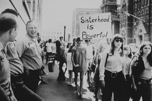 Photograph: Women marching c. 1975

Source: Getty