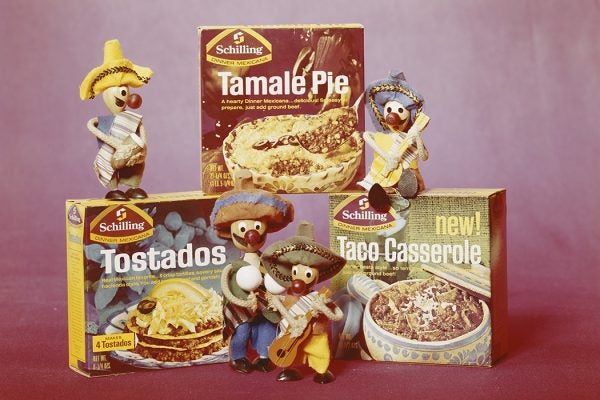 Boxes of tamale pie, tostadas and taco casserole with figurine