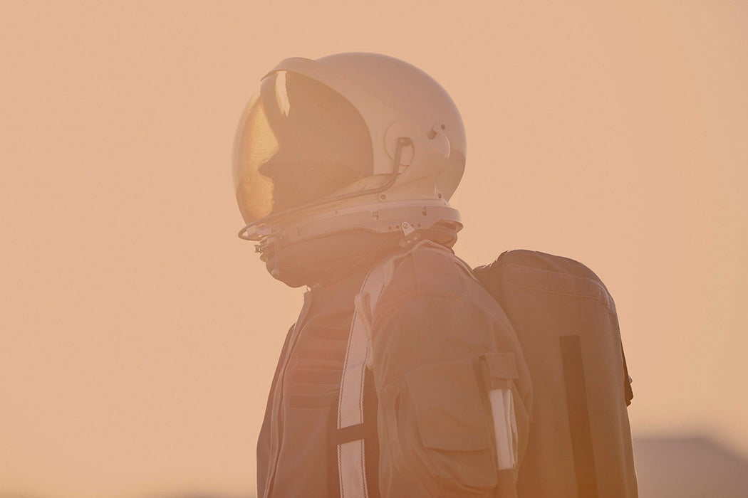 Portrait of astronaut in space suit and helmet