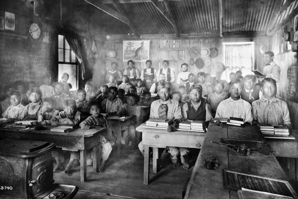 Classroom of students with their teachers inside a Walapai school at Hackbury, Arizona, circa 1900