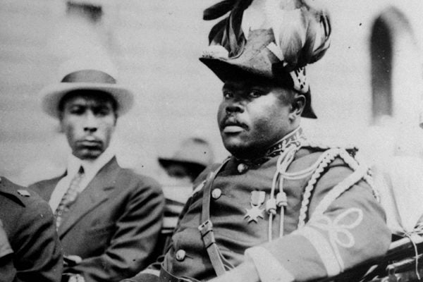 Marcus Garvey is shown in a military uniform as the "Provisional President of Africa" during a parade on the opening day of the annual Convention of the Negro Peoples of the World at Lenox Avenue in Harlem, New York City, 1922