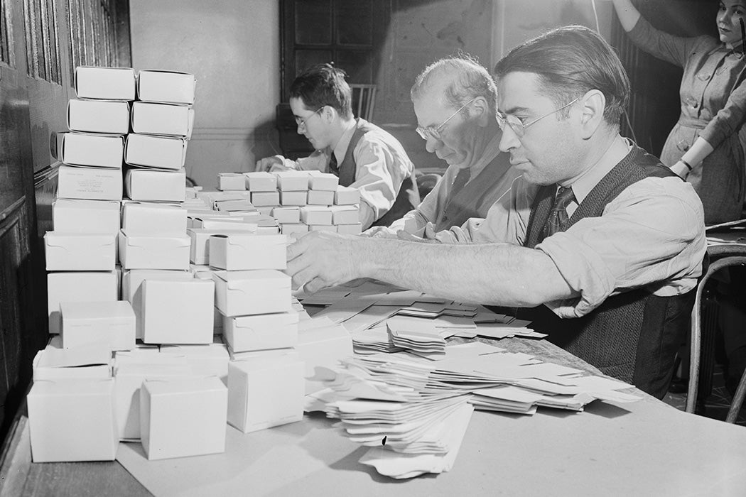 Blind men working on boxes for Elizabeth Arden cosmetics at the Lighthouse, an institution for the blind in New York