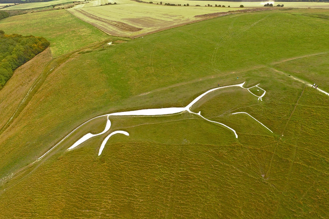 An aerial view of the prehistoric White horse carved into the hillside at Uffington,Berkshire