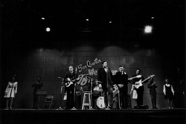 Johnny Cash on stage with his band, in concert at San Quentin State Prison, California, February 24th 1969.