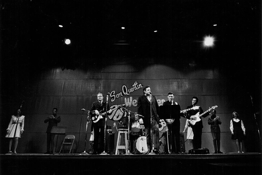 Johnny Cash on stage with his band, in concert at San Quentin State Prison, California, February 24th 1969.