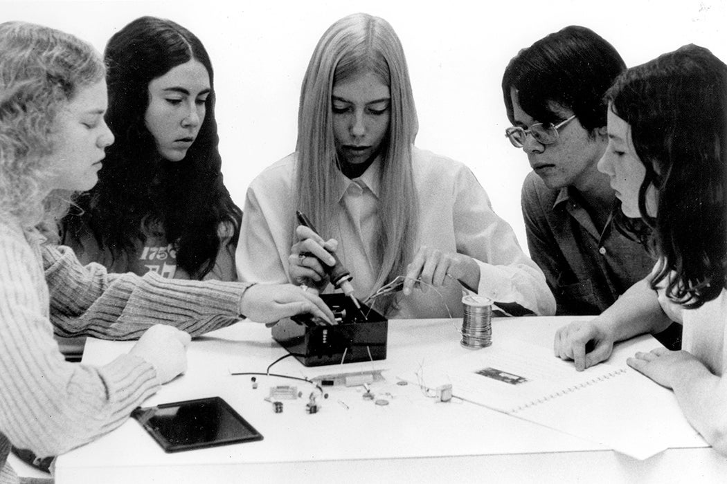 A group of high school students constructs basic measuring devices for testing air, water, noise, and radiation-pollution levels. c. 1972