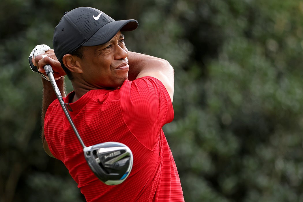Tiger Woods of the United States plays his shot from the 15th tee during the final round of the Masters at Augusta National Golf Club on November 15, 2020 in Augusta, Georgia.