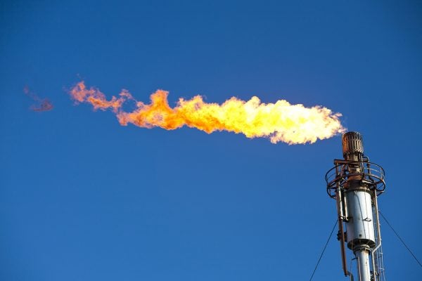 Flaring off gas at the Flotta oil terminal on the Island of Flotta in the Orkney's Scotland