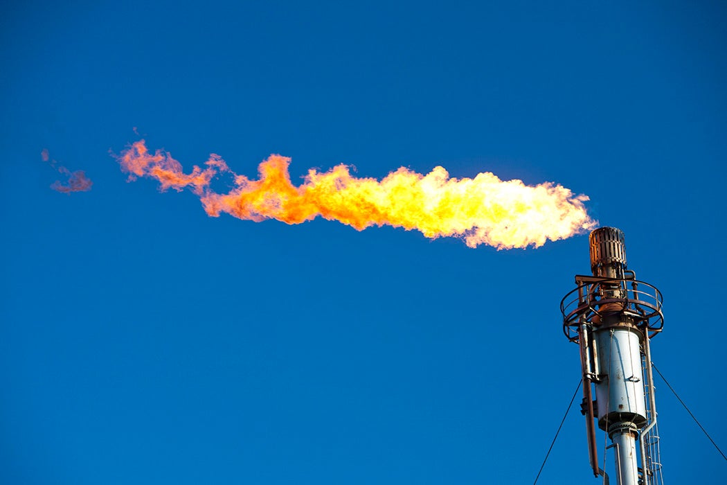 Flaring off gas at the Flotta oil terminal on the Island of Flotta in the Orkney's Scotland