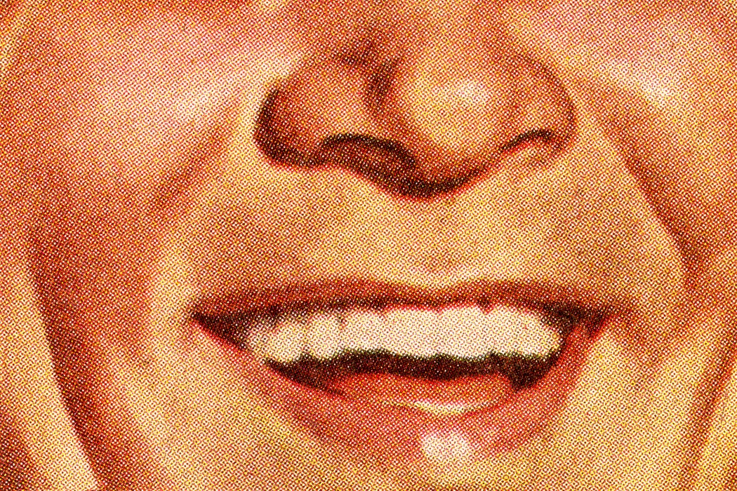 Close-up of a Man's smiling mouth