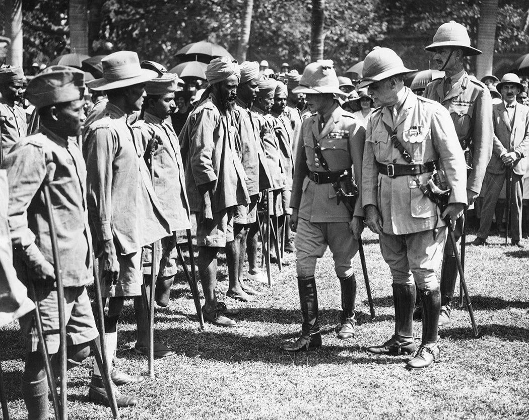 The Prince of Wales inspecting maimed soldiers during his visit to Bombay, India