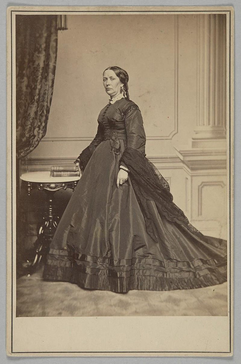 Cabinet card of Mary Jane Hale Welles in a funeral dress by Elizabeth Keckley