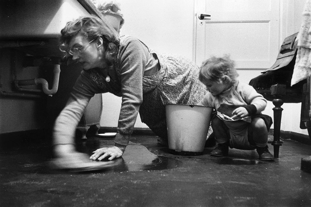 Housewife Annie Driver of Hunstanton, Norfolk, scrubbing the floor, 1956