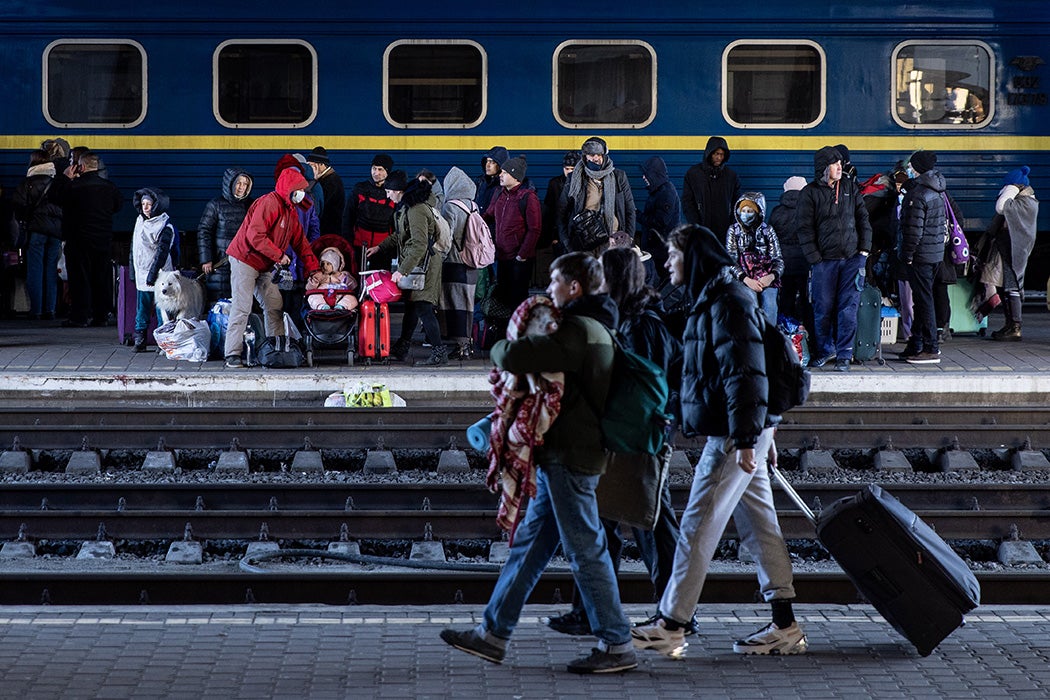 People wait for trains on the platform at Kyiv train station on February 28, 2022 in Kyiv, Ukraine.