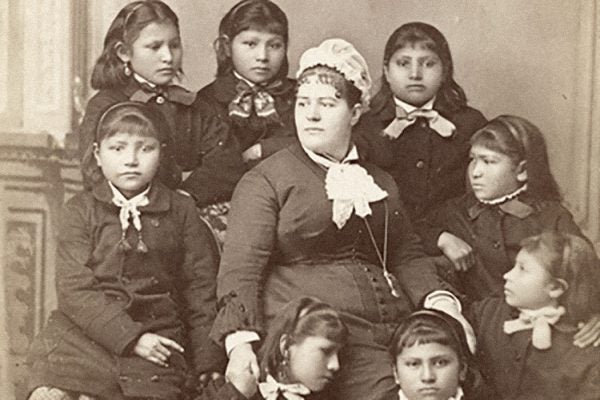 Mary R. Hyde, matron, and students at Carlisle Indian Training School
