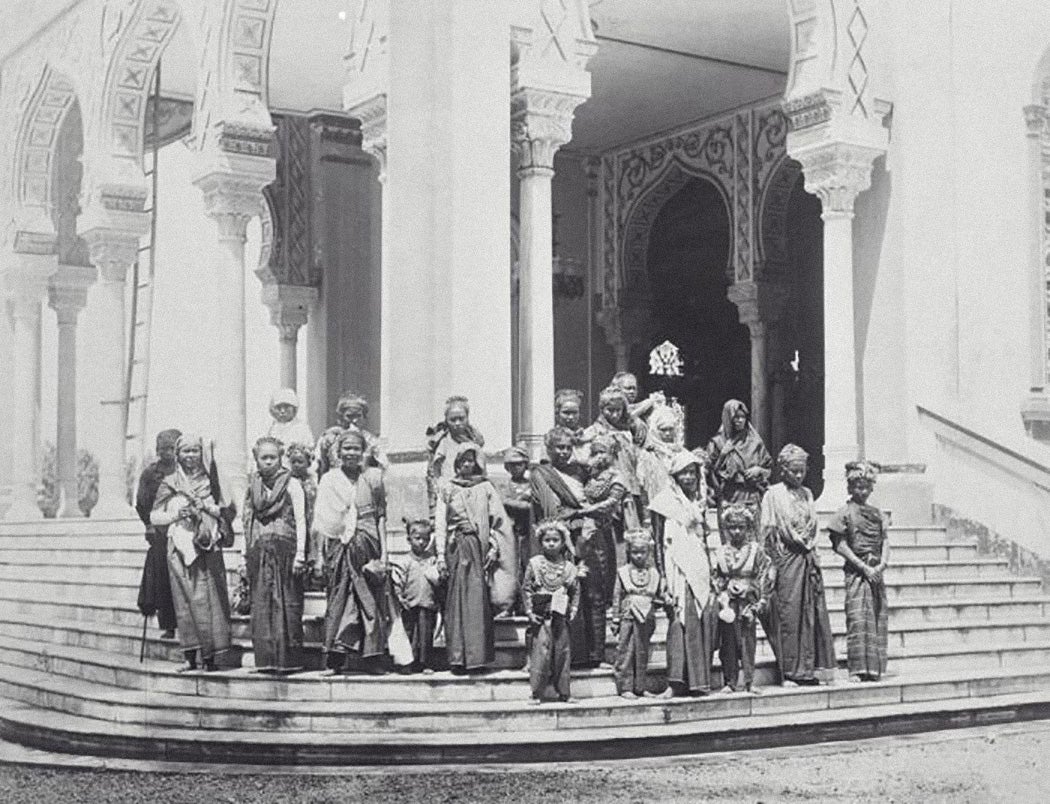 Acehnese women in festive dress in front of mosque, Kutaradja, Sumatra, Indonesia 