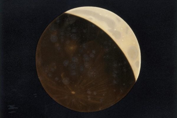 Colour lithograph of partial lunar eclipse by Etienne Leopold Trouvelot