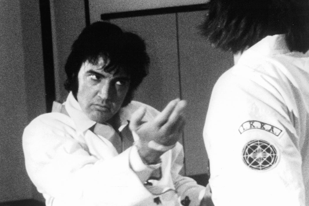 Elvis Presley is shown during a karate workout, as seen in the film 'This Is Elvis', 1981.