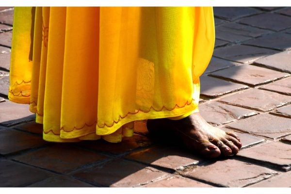 A woman's sari and feet
