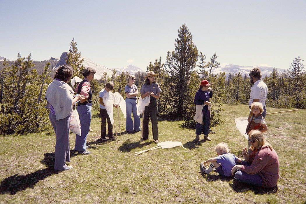 Photograph: NPS employee talking to visitors in the Tuolumme Meadows in Yosemite National Park.

Source:https://commons.wikimedia.org/wiki/File:HFCA_1607_NPS_Employees,_Women_512.jpg_(a3046c74ddc24fe6bc480fae94f4ce43).jpg