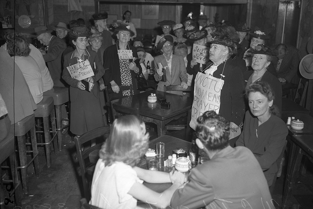 Women's Christian Temperance Union lecturing in a crowded bar in Pasadena, CA., 1947