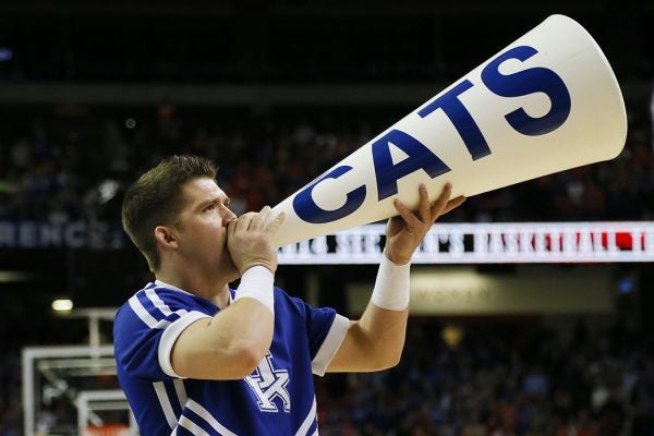 A Kentucky Wildcats cheerleader performs in th first half against the Florida Gators during the Championship game of the 2014 Men's SEC Basketball Tournament