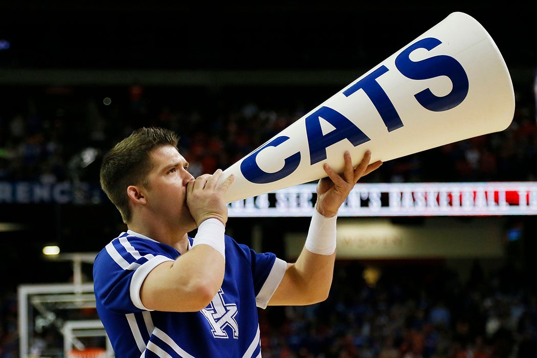 A Kentucky Wildcats cheerleader performs in th first half against the Florida Gators during the Championship game of the 2014 Men's SEC Basketball Tournament