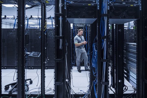 A person working in a data center