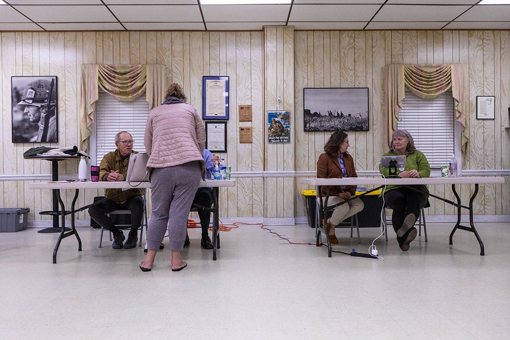 A voter checks in at the Veterans of Foreign Wars Post 3103 polling location on November 8, 2022 in Fredericksburg, Virginia.
