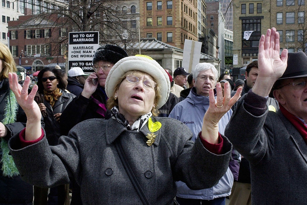 Photograph: Anti-gay marriage protestors pray outside the Massachusetts State House March 11, 2004 in Boston, Massachusetts. 

Source: Michael Springer/Getty