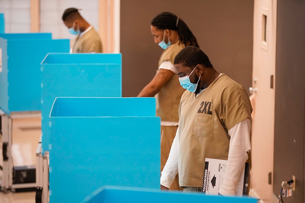 Cook County jail detainees cast their votes after a polling place in the facility was opened for early voting on October 17, 2020 in Chicago, Illinois