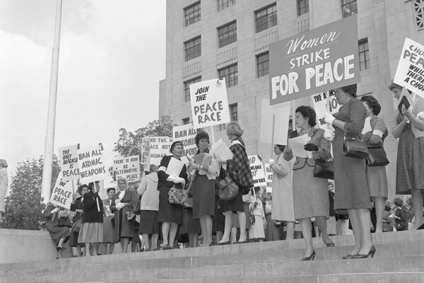 Women strike for peace, picket march in front of state building in Los Angeles, 1961