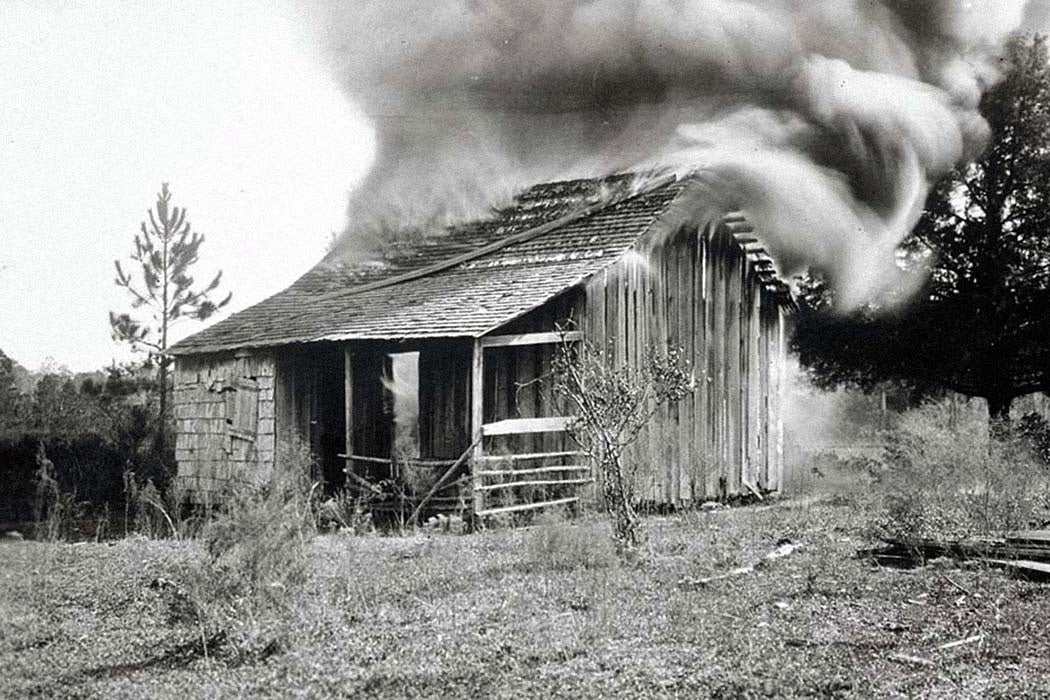 the Florida Archives lists the image as representing the burning of a structure in Rosewood