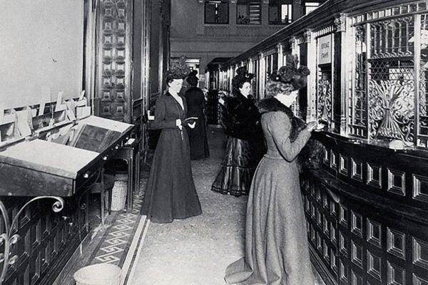 Ladies at the tellers’windows of the Fifth Avenue Bank, New York 1900
