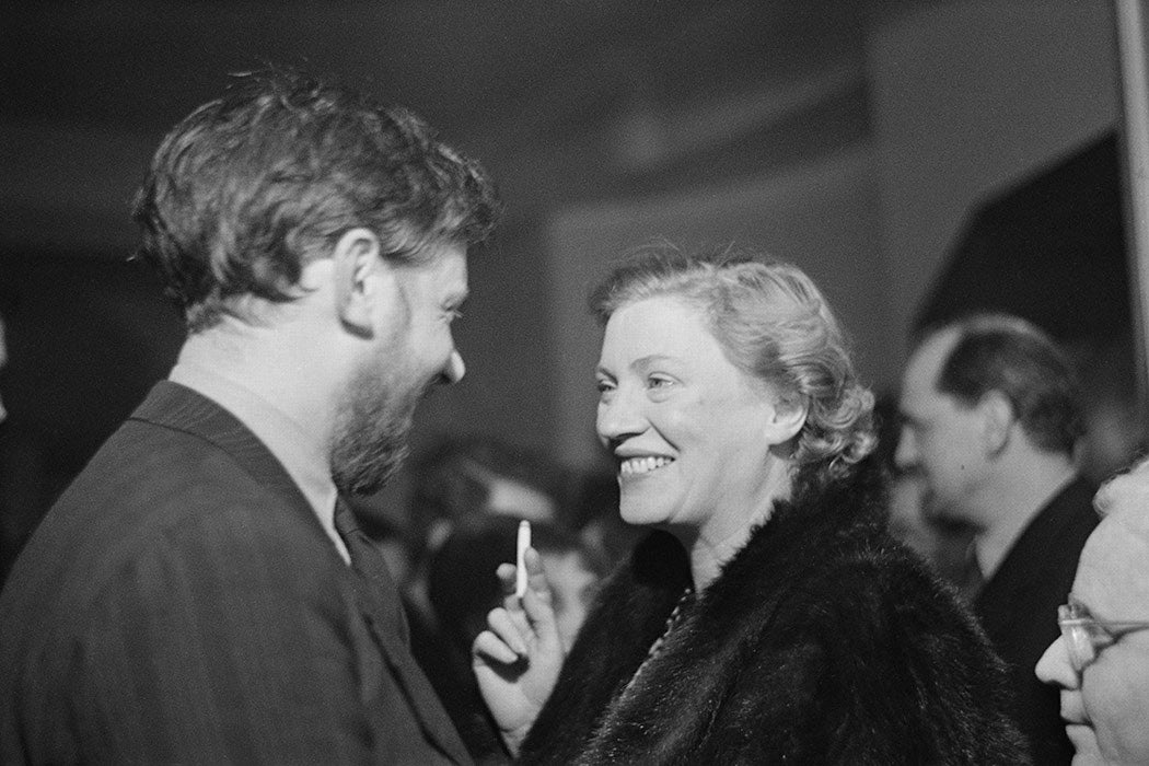 English art and radio critic Frederick Laws (left) and American photographer Lee Miller attend a one-night performance of Pablo Picasso's play 'Desire Caught By The Tail' at the Rudolf Steiner Hall in London, March 1950.