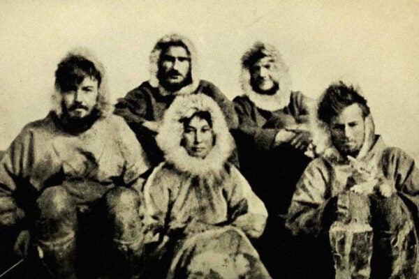 The Wrangel Island Expedition team in 1921: Ada Blackjack, Allan Crawford, Lorne Knight, Fred Maurer, Milton Galle, and Victoria the cat.