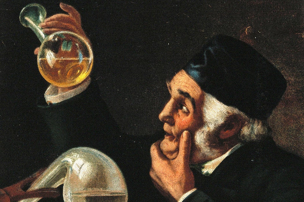 A chemist examining a flask of urine