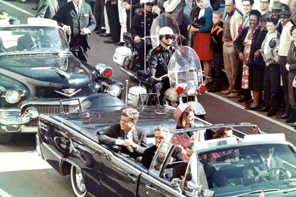 President Kennedy in the limousine in Dallas, Texas, on Main Street, minutes before the assassination