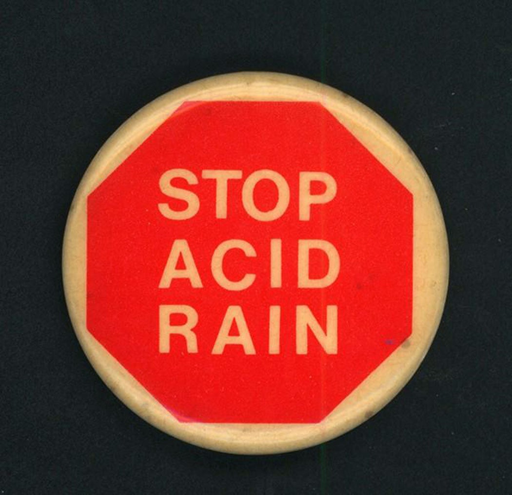 "Stop Acid Rain" white with red stop sign button.