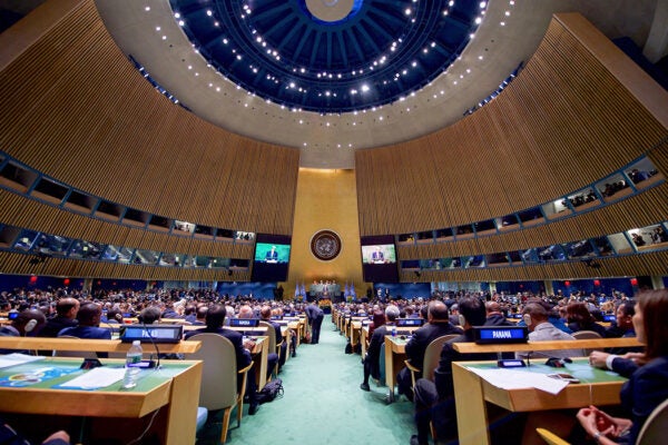 U.S. Secretary of State John Kerry addresses delegates before he signed the COP21 Climate Change Agreement on Earth Day, April 22, 2016, at the United Nations General Assembly Hall in New York, N.Y.