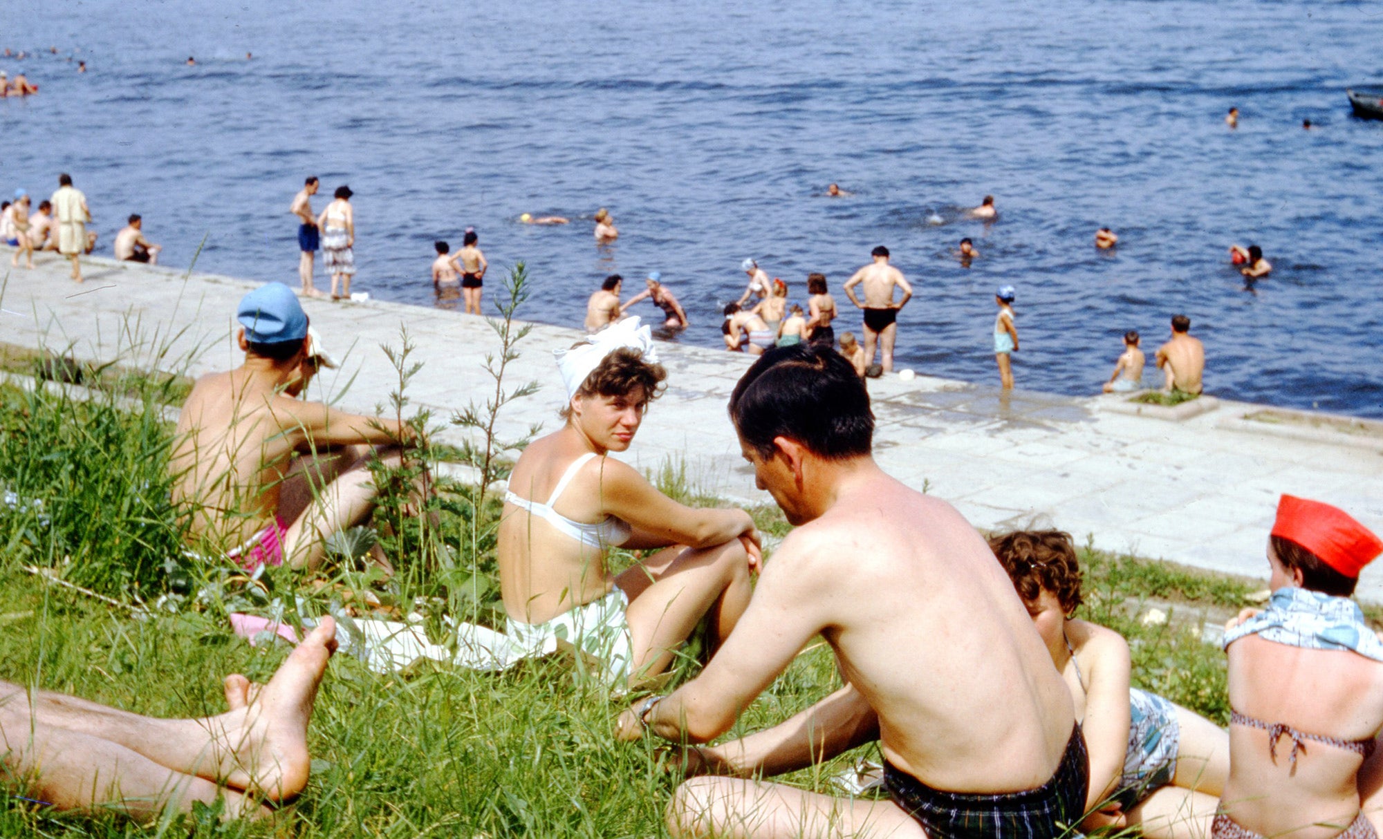 People relaxing on the beach along the Moskva River in Moscow, Russia in 1972