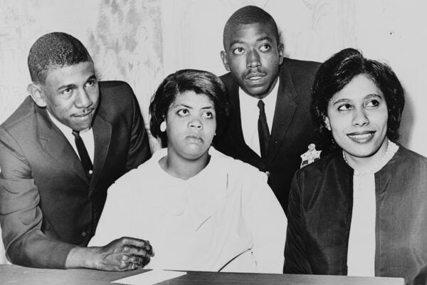 Linda Brown Smith, Ethel Louise Belton Brown, Harry Briggs, Jr., and Spottswood Bolling, Jr. during press conference at Hotel Americana, 1964