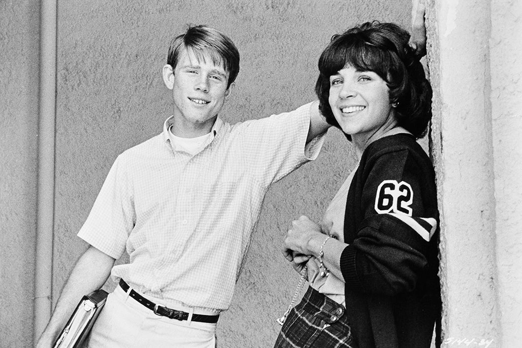 American actors Cindy Williams (right) and Ron Howard as Laurie and Steve on the set of the Lucasfilm production 'American Graffiti',