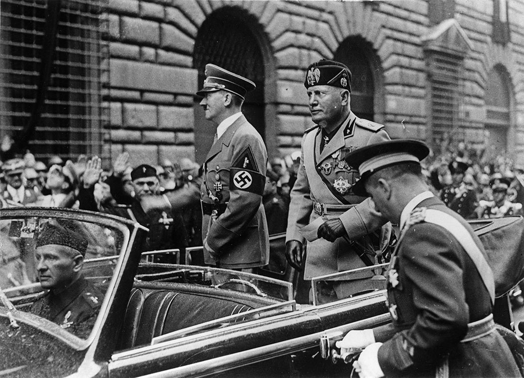 German dictator Adolf Hitler and Italian dictator Benito Mussolini drive through Rome, 1938