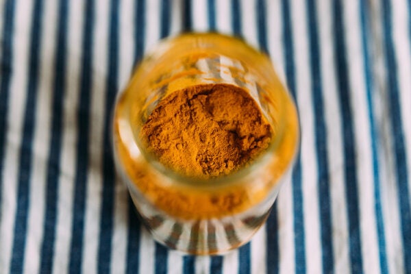 Turmeric in a glass jar, as seen from above