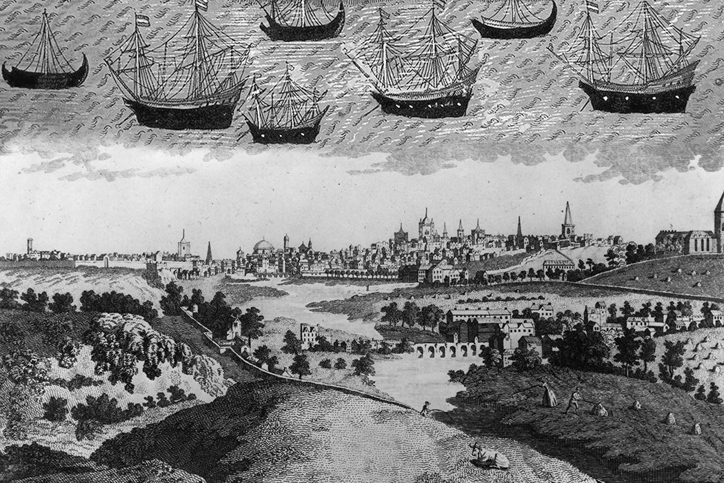 An illustration of Dublin with a fleet of medieval ships above it in the sky