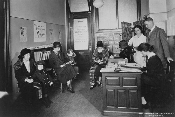 A group of women sit in the waiting room of the American Birth Control League Clinic, New York, 1921
