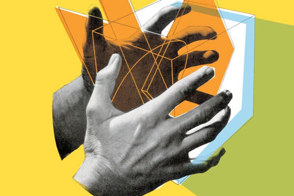 An illustration of a cube in hands