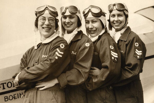 A Flying First Aid Unit. First group of its kind to be organized in the Northwest. Left to right are: Mildred Merrill, Opal Hiser, Mary Riddle, and Gladys Crooks